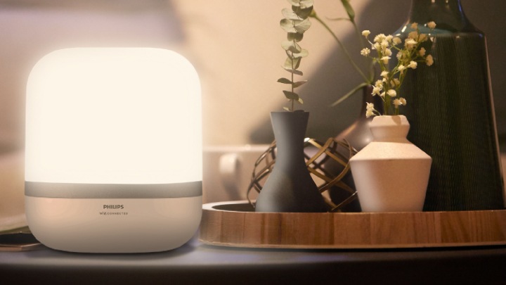 A warm glowing light on a night stand